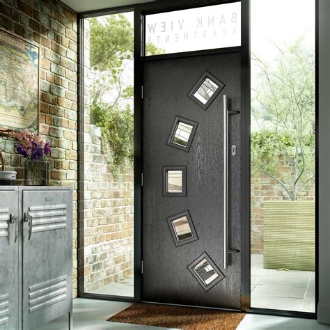 Although composite doors come in a number of wood grained colours, a black composite door in any style can always be enhanced by the addition of the by the although the most famous black door has brass furniture, chrome is the modern choice for most customers. Composite Doors Bradford, Leeds | Composite Front Doors Leeds
