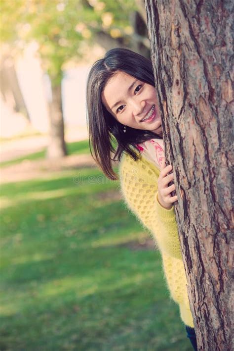 Woman Hiding Behind A Tree Stock Image Image Of Female 35078567