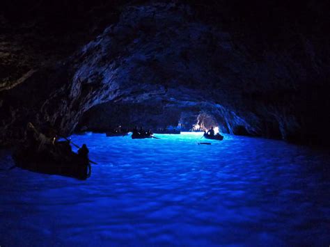 Float Through The Blue Grotto A Sea Cave In Capri With Stunning Blue