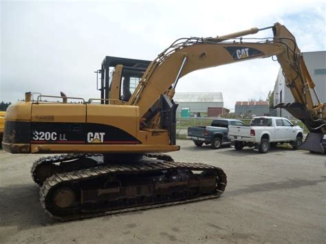 Find used equipment other construction excavators and mini excavators caterpillar. Caterpillar 320C LL Excavator - V.I. Equipment