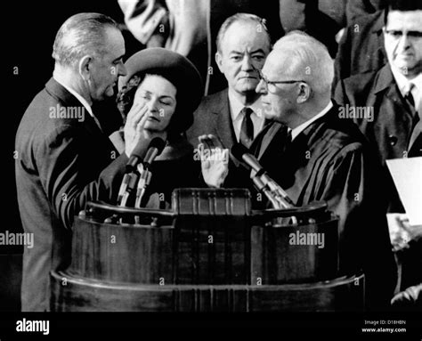 president lyndon johnson takes the oath of office at his 1964 inauguration l r president and