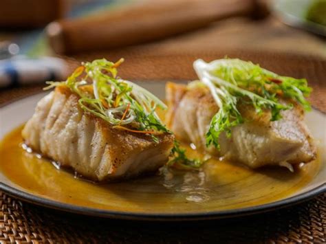 Pan Seared Chilean Sea Bass With Frisee And Ponzu Butter Recipe Food Network