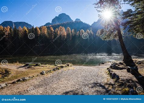 Lake With Reflection Of Mountains At Sunrise In Autumn In Dolomites