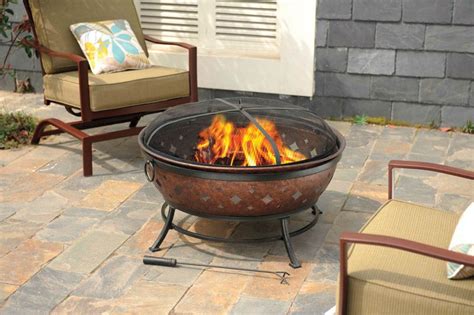 Aluminum plated fire bowl with square steel burner with steel cover lid, easily changes this unit into coffee table when not in use. Living Accents Noma Fire Pit 22.4 in. H x 35.8 in. W Steel ...