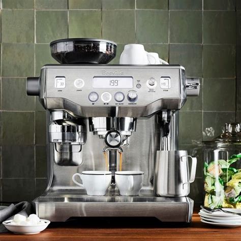 All you have to do is place the portafilter into the grinder cradle. Breville Oracle Espresso Machine | Espresso machine ...