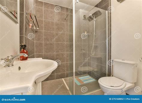 A Bathroom With A Shower And A Sink And A Stock Photo Image Of House