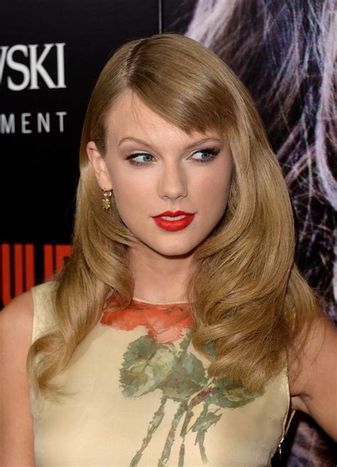 Taylor Swift Long Formal Wavy Hairstyle With Side Swept Bangs Styles