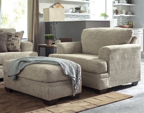 This oversized chair and ottoman set makes a wonderfully comfy addition to any living room, den or other sitting room. Benchcraft Barrish Contemporary Chair and a Half & Ottoman ...
