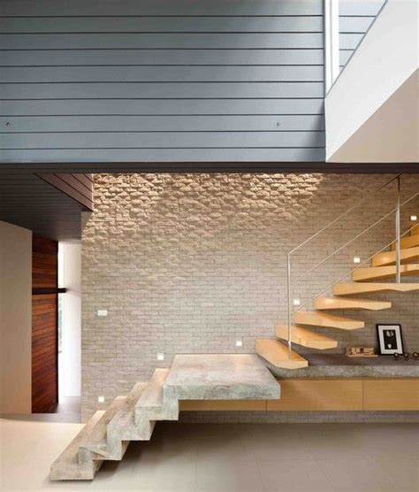 An architect describes arched stairs with interesting design ideas and styles using materials like arched stairs have advantages and disadvantages. Gallery of demoH Home / Lynk Architect - 20 | Staircase ...
