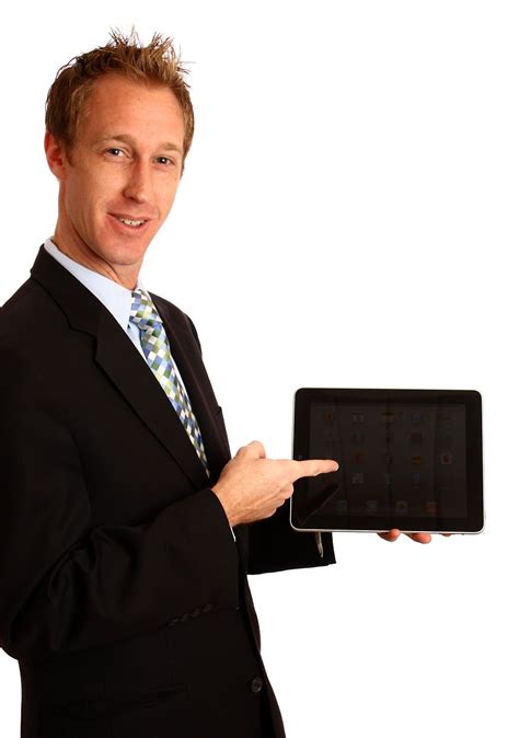 Computer Business Free Stock Photo A Young Businessman Holding A