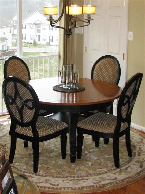 Neutral Transitional Dining Area With Small Round Table