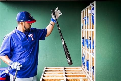 Texas Rangers Catcher Robinson Chirinos Grabs A Bat Out Of The Rack In
