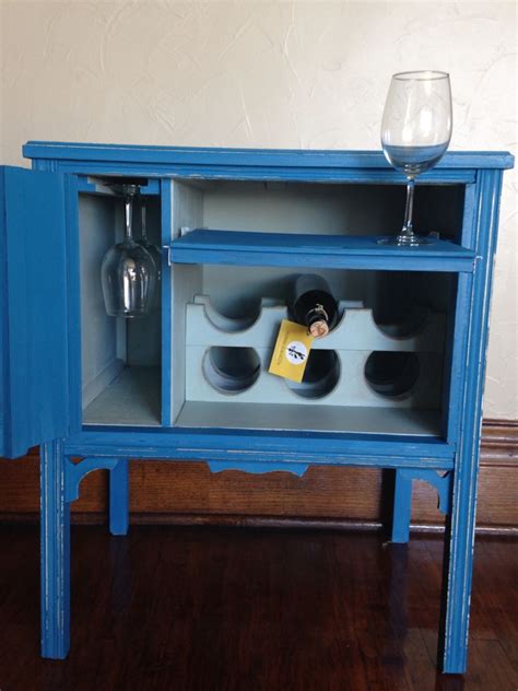 It's so pretty now, but wait till you see what i started with, and how i had to go about repairing it. old record cabinet repurposed into wine cabinet | Record ...
