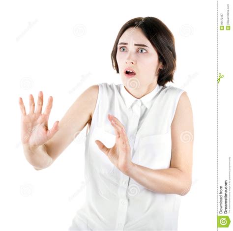 A Terrified Girl Isolated On A White Background. A Scared ...