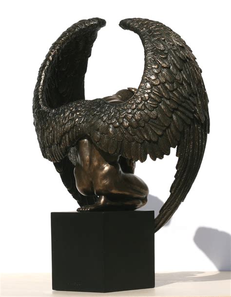 Winged Male Nude Angel Crouching On Plinth Statue Buy Online In Bahamas At Desertcart