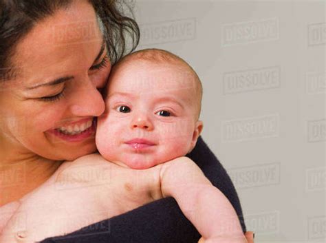 Mother Holding Newborn Baby Stock Photo Dissolve