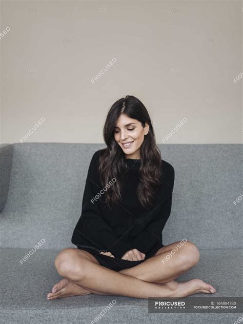Barefoot Woman Sitting Legs Crossed
