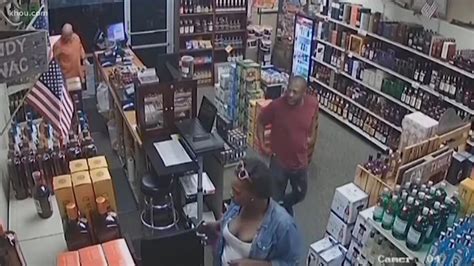 Couple Caught On Camera Stealing Hennessy Bottles From Liquor Store