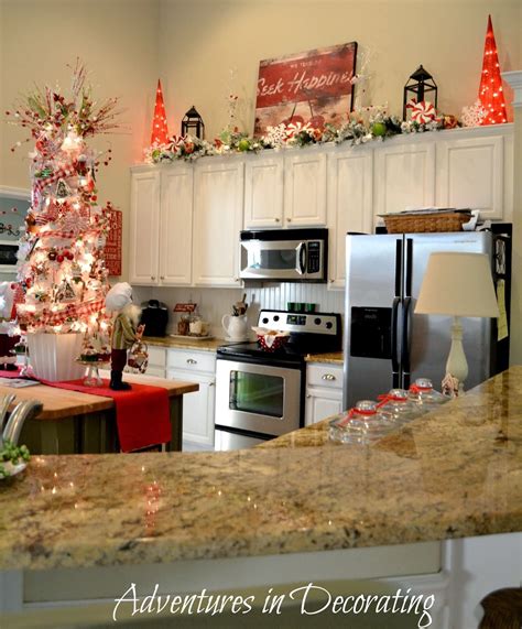 Vegetation decorations, whether real or fake, can add a sense of health and rejuvenation to your kitchen. Love the lit garland and beautiful Christmas decor above ...