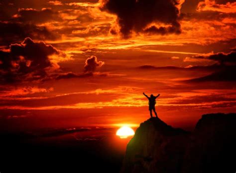 Man On Top Of The Mountain With Arms Raised Lift Worship
