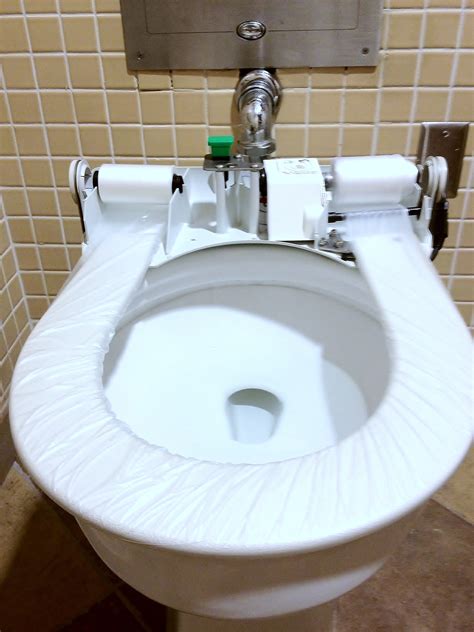 If the toilet is not in acceptable condition, pull out the cover and place it so the flap hangs into the bowl. Public Restroom Toilet Covers - Brillseat Automatic Seat ...