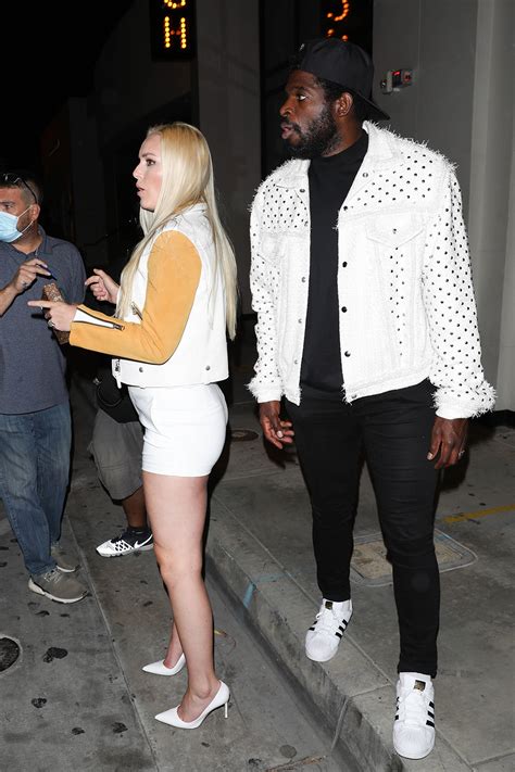 Lindsey Vonn Sports Moto Jacket Shorts And White Heels For Night Out
