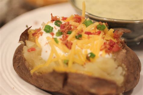 Learn how easy it is to come home to perfect baked potatoes when you make baked potatoes in a crock pot! Crock Pot Baked Potatoes - Repeat Crafter Me
