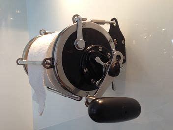 Is it something simple and practical? Fishing Reel Toilet Roll Holder - what you need when you ...