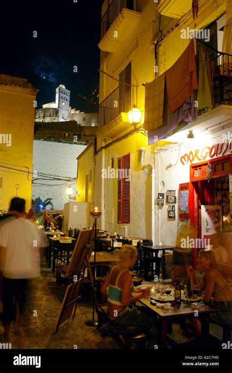 Narrow Streets With Cafes And Bars At Night In Old Town Ibiza Island Of
