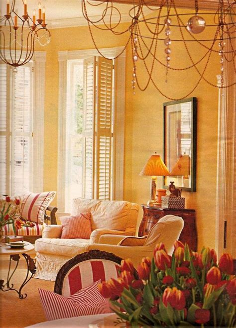 The upholstery and carpet's neutral colors also serve as a background the colors complement each other so that blue makes the orange more orange and vice versa. 20 Fabulous Shades Of Orange Paint and Furnishings | Living room orange, Orange living room ...