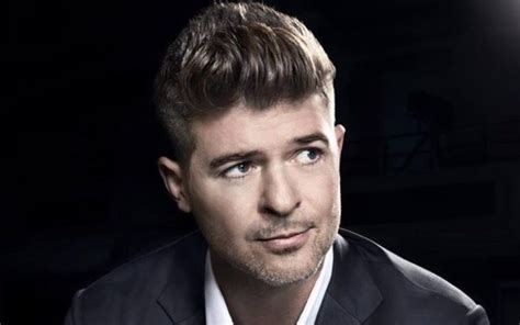 The married couple arrive at new york city's jfk airport hand in hand. Robin Thicke - Biography, Son, Net Worth, Wife or ...