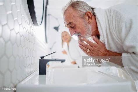 old couple bathroom photos and premium high res pictures getty images