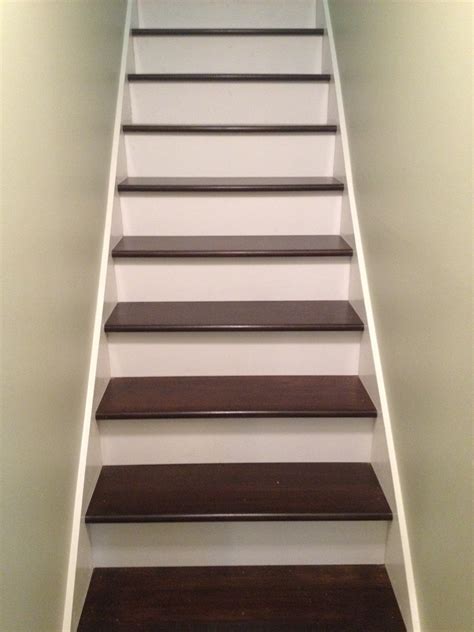 Wooden stairs - Battle Creek Tile & Mosaic Co., Inc.
