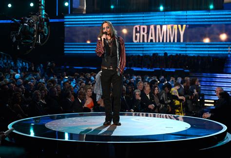 Gone were the dressed down looks of previous virtual ceremonies. Johnny Depp took the stage at the Grammys. | Highlights ...