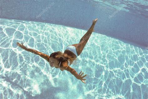 Underwater Woman Portrait With White Bikini In Swimming Pool Stock