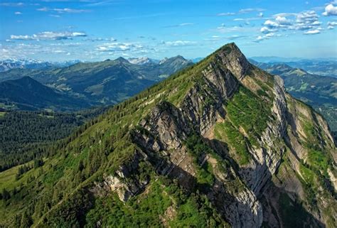 Free Photo Grass Covered Mountains