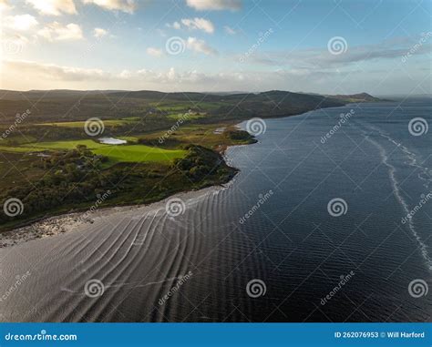 Calm Waters Aerial View Of The Scottish Coast At Sunset Stock Image