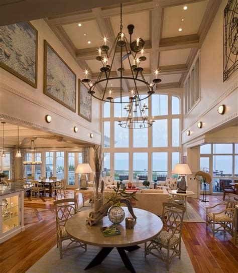 I love, love, love coffered ceilings. The beauty and advantages of coffered ceilings in home design