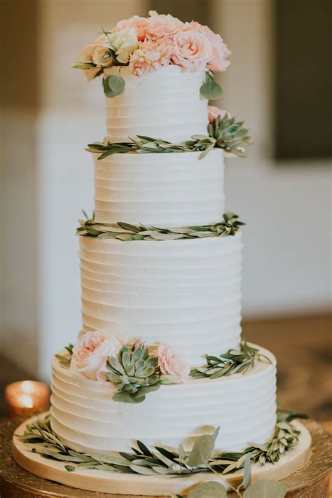 Classic Bridal Cake Trimmed With Olive Leaves Succulents And Garden