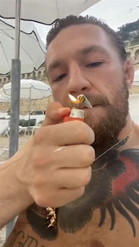 Conor Mcgregor Puffs On Cigarette As He Relaxes With Dee Devlin And