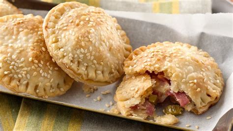 This pie crust recipe is easy to make, delicious, and fool proof! Muffuletta Mini Pies recipe from Pillsbury.com