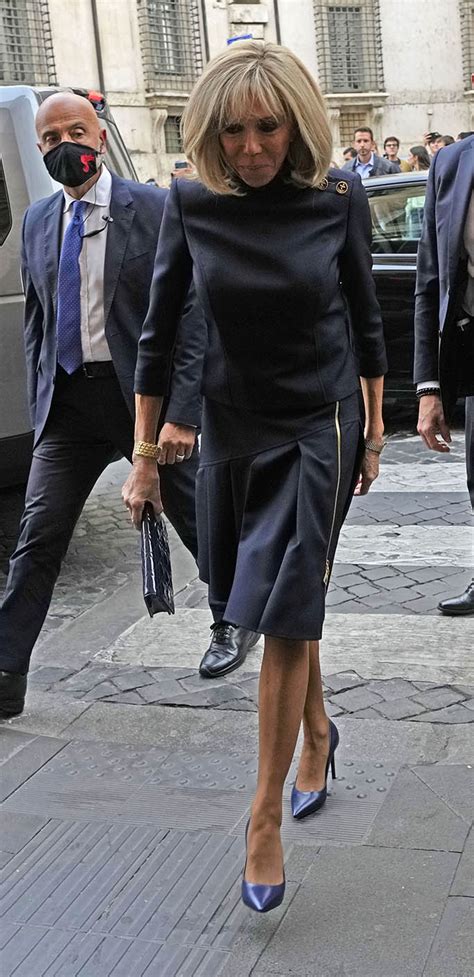 Jill Biden Meets Brigitte Macron In Navy Animal Print Suit And Pumps