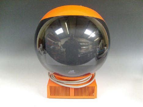 Maybe you would like to learn more about one of these? A 1970's JVC Videosphere space helmet tv, orange colour ...