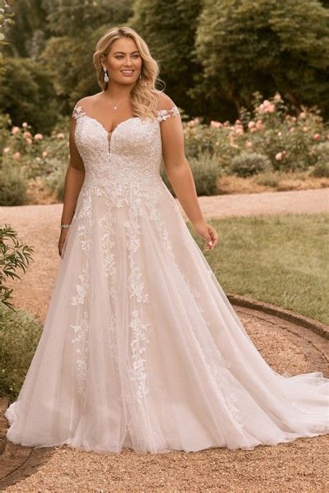 This Sophia Tolli Y LS Esther Luxe Chiffon Plus Size Bridal Gown Features A Ruched