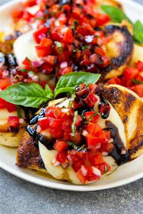 Meet bruschetta chicken, a speedy summer dinner that tastes super indulgent (thanks to juicy slices of tomatoes and a dusting of parm) but is actually low cal, low carb and packed with protein. Bruschetta Chicken - Dinner at the Zoo