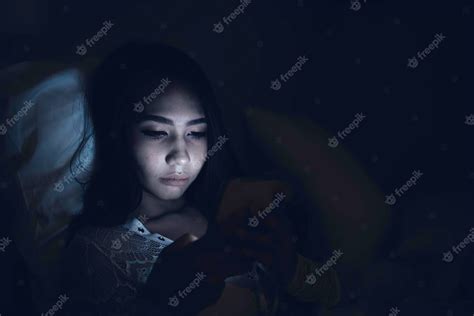 Premium Photo Asian Woman Playing Game On Smartphone In The Bed At Nightthailand Peopleaddict