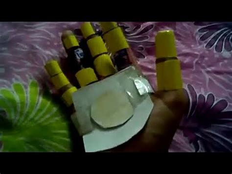 Now make a hole in the center, then make 8 more holes around it. Iron man hand (cardboard making) - YouTube