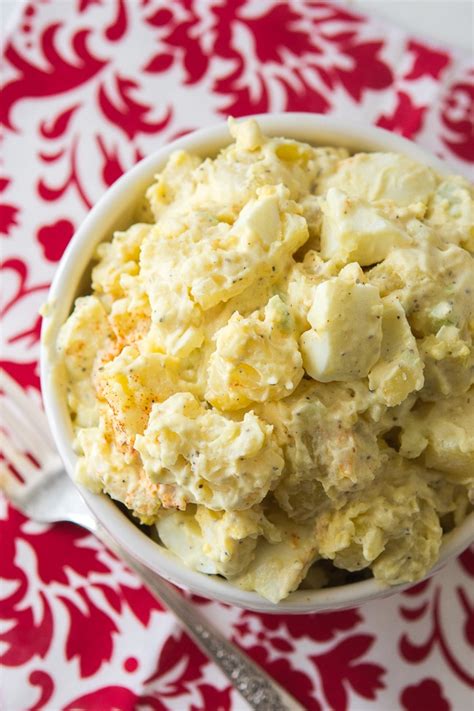 Prepared using potatoes, eggs, parsley, mayonnaise, dill pickles; Classic Potato Salad Recipe - Easy Potato Salad with Egg
