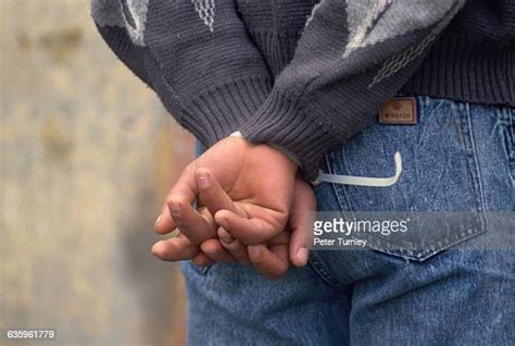Hands Behind Back Tied Bildbanksfoton Och Bilder Getty Images