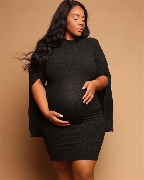 black maternity dress this mini maternity dress features a cape and has a glittery finish